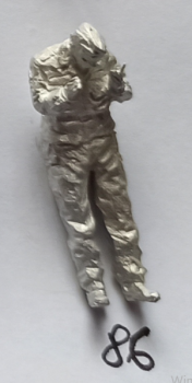 unpainted NVA private lighting a cigarette -0-