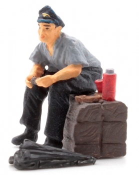 Engine driver at breakfast with jacket -0-