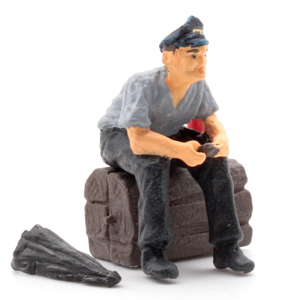 Engine driver at breakfast with jacket -0-