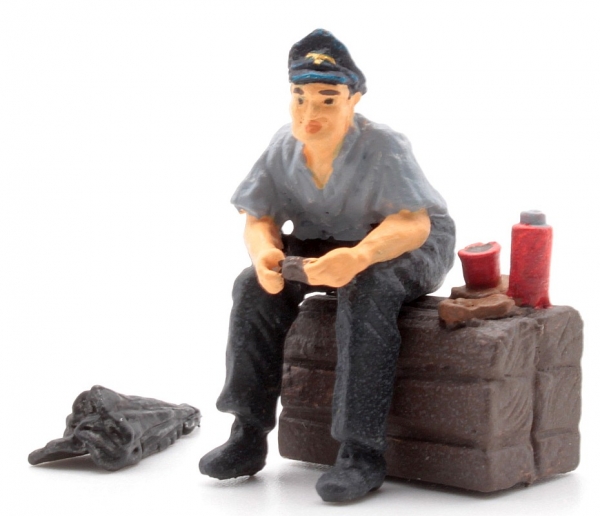 Engine driver at breakfast with jacket -0-
