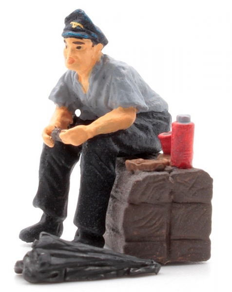 Engine driver at breakfast with jacket -0-