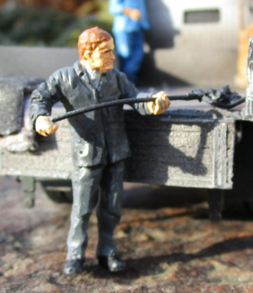 Man shoveling coal -0-